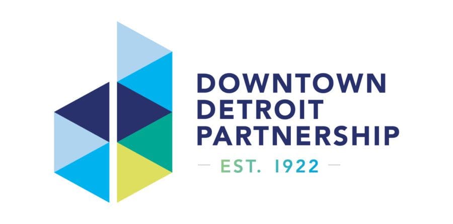 DDP logo, sketched as a capital D illustrated as multi-colored triangles. Followed by "established 1922"